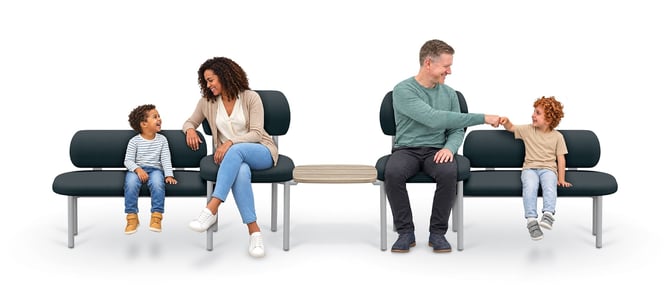 Coradle adult and children's bench seating with Add-A-Table showing parent-child scale difference in a coordinated configuration
