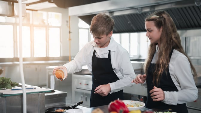 Culinary arts students cooking